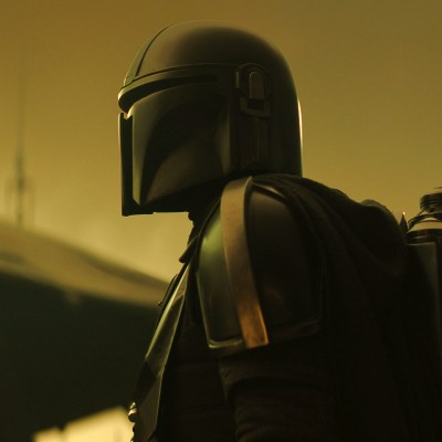 Mandalorian with pure full black armor and black fur cloak and helmet has a  scar on it on Craiyon