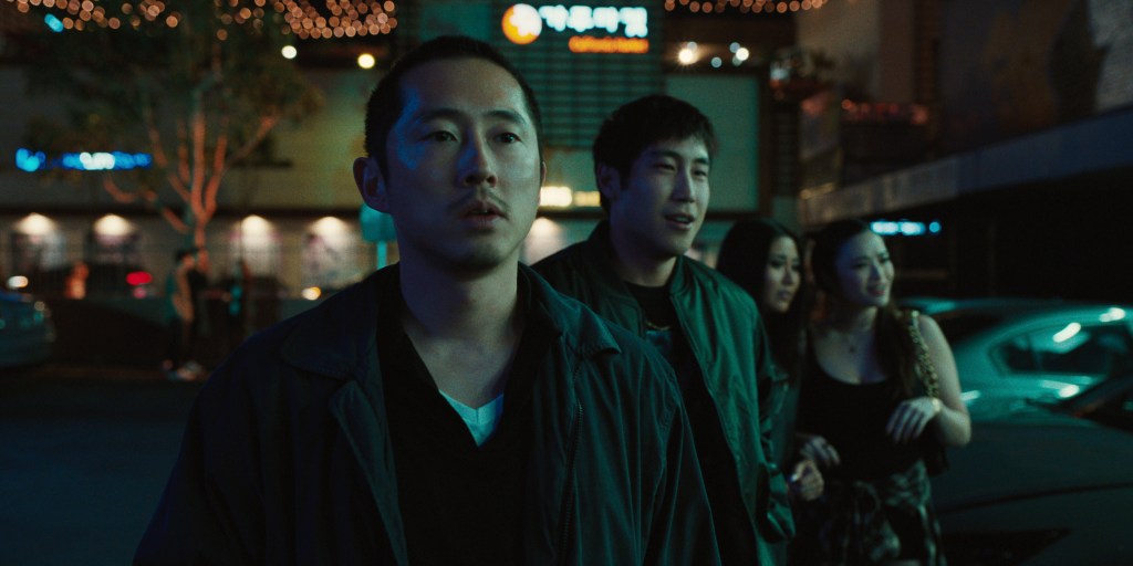 Beef. (L to R) Steven Yeun as Danny, Young Mazino as Paul in episode 102 of Beef. Cr. Courtesy of Netflix © 2023