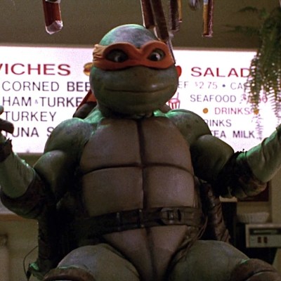 Michelangelo and sausages in Teenage Mutant Ninja Turtles 2 Ooze